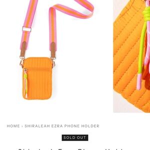 Shiraleah Orange Phone Holder with Pink Strap